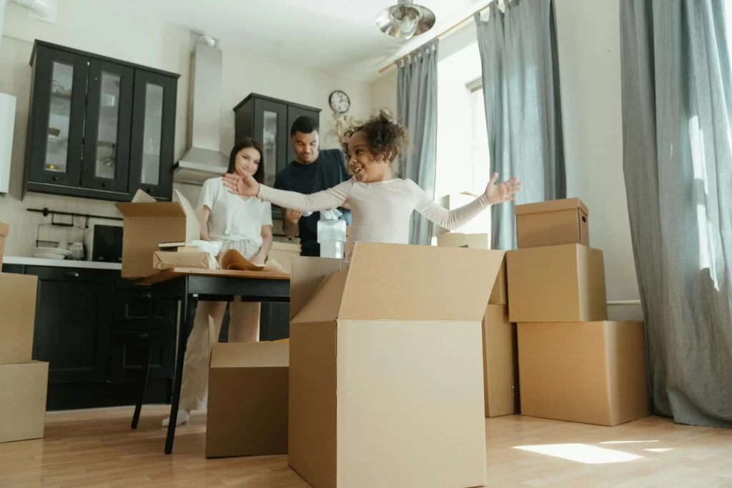 Kids in moving boxes